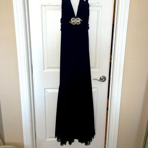 Long black halter cocktail/ prom dress. Low back. Mary L couture size 8